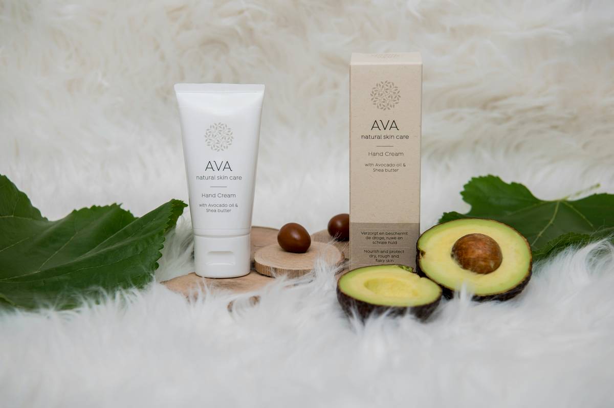 Bottles of seaweed serum placed alongside moisturizer on a wooden shelf