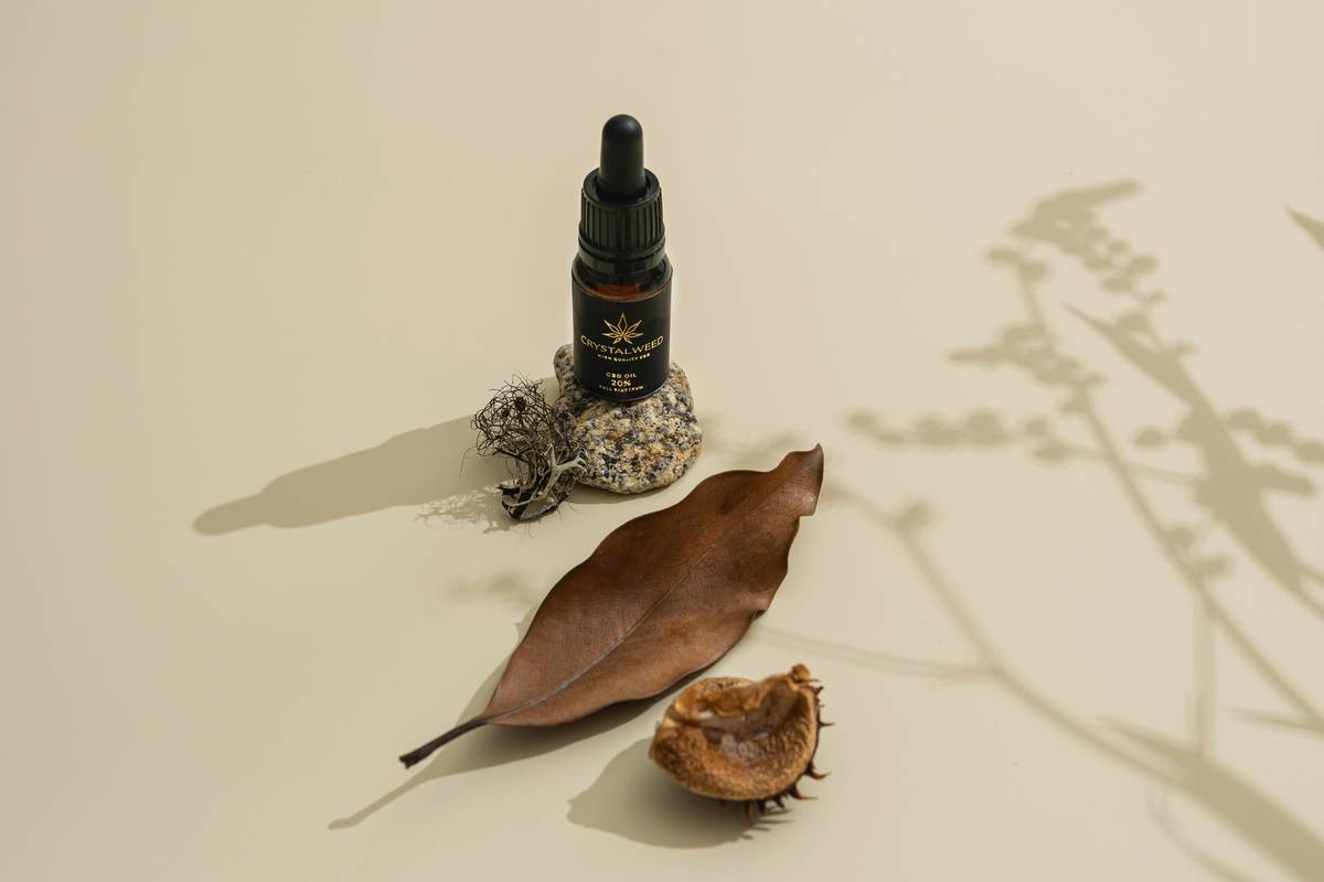 Close-up shot of a creamy green seaweed face mask being applied