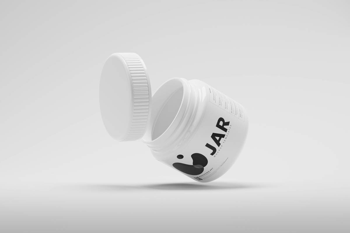 A jar of organic chlorella powder next to fresh seaweed